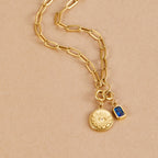 'The Truth' Gold Eye Coin Charm